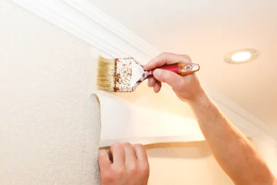 Pose de papier peint à la Rouquette — revêtements muraux et toiles de verre